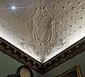 Ceiling engraving in the chamber of the New York City Council. Note the many deviations from the official seal design.