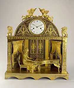Clock; 1807–1810; fire-gilt bronze, blackened bronze, enameled metal (dial), blued steel (hands); glass; 56 x 49.7 x 18.5&nbsp;cm; Cooper Hewitt, Smithsonian Design Museum (New York City)
