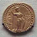 Coin of Huvishka 126–163, with Kushan goddess Rishti, possibly depicted as Roma copied from a Roman coin.[28][29][30]