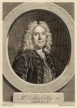 Pudgy late-middle-aged man wearing 18th century dress: a full wig, velvet jacket, waistcoat and cravat, looking through a faux-architectural roundel, above a plinth bearing his name: Mr Colley Cibber, Anno Ætatis 67.