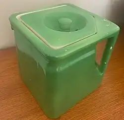 Green cube teapot handle view