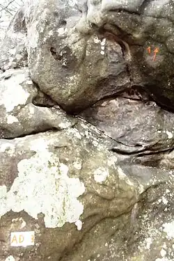 First rock (départ) of AD route #3 (Roche aux Fées area, Trois Pignons), and move #1