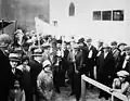 Dedication of the new Synagogue, Kirkland Lake, Ontario. Rabbi Joseph Rabin carrying the Torah, 1929