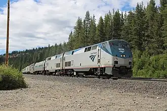 An Amtrak train passing through Norden in 2025