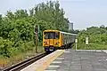 A Merseyrail Class 507 departs towards Liverpool.