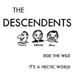 A white album cover reads "The Descendents" across the top in large capital typeface. The two song titles, "Ride the Wild" and "It's a Hectic World", are printed in capital letters on the lower right. In the center of the cover are caricatures of each of the three band members, drawn from the shoulders up and with their names underneath. From left to right they read "Tony", "Frank", and "Bill".