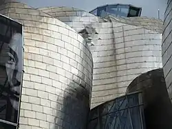 Facade of the Guggenheim Museum in Bilbao with a Yoko Ono Banner