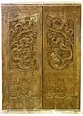 Vietnamese wood carving on one of the doors of the Phổ Minh pagoda