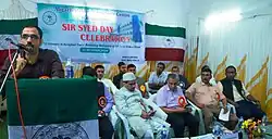 Dr. Umer Thasneem speaking on Sir Syed Day at AMU Malappuram Campus in 2019.