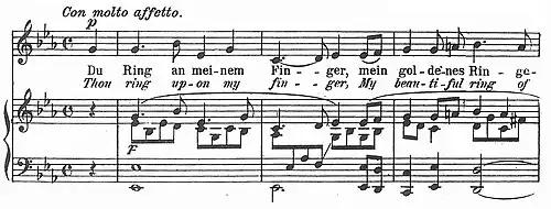 Musical score with line for voice and two lines below for piano accompaniment
