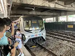 E71-E112 prepares to depart Sha Tin station for the final time on 6 May 2022