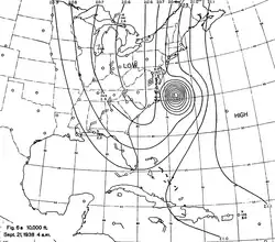 Extratropical transition gradually begins as the hurricane interacts with the frontal boundary on September 21