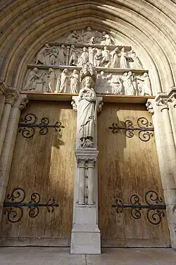 The central portal and sculpture of Saint John the Baptist