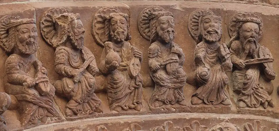 Elders of the apocalypse with rebecs (substitute for harps) and vials. Santo Domingo de Soria