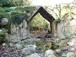 Corbel arch in the shape of an isosceles triangle, supporting the Greek Eleutherna Bridge
