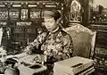 Emperor Khải Định in his study, 1916