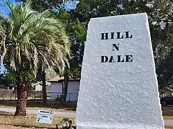Monument sign located at the entrance to the community