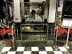 Entranceway downstairs one level to the Ambassador Grill and Ambassador Lounge, Millennium Hilton Hotel One UN Plaza.