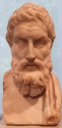 Photo of a bust of a bearded man