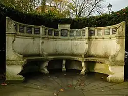 External semicircular stone war memorial by Inigo Triggs, c. 1920