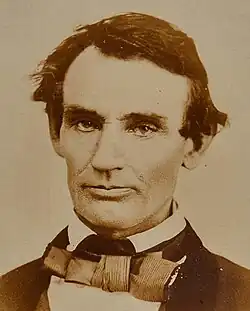 Head and shoulders portrait of a clean-shaven Lincoln