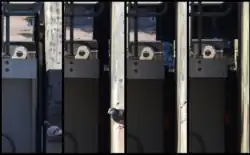 Left to right: caisson door (behind the rail) aligned with basin door but with a gap, u-shape seal extended, water filled, and doors lowered