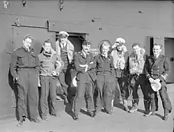 Pilots of 888 Fighter Squadron on Board HMS Formidable in the Mediterranean, December 1942. L to R : Sub Lieut (A) A R Astin, RNVR, Sub Lieut (A) R Phillips, RNVR, Lieutenant (A) D M Jeram, RN, Captain F G Bird, RM (Commanding the Squadron), Sub Lieut (A) E J Clark, RNVR, Sub Lieut (A) E Stilliard, RNVR, Lieutenant (A) P G Burke, RNVR.