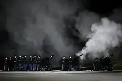 A 21-gun salute is given during the arrival of the casket of former President Gerald R. Ford at Andrews Air Force Base in Maryland, Saturday, December 30, 2006.