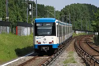 A M4 series EMU near the Postjesweg station