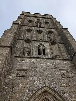 Front of the tower showing mythological iconography