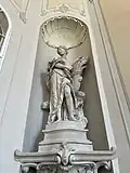 First of four Baroque sculptures in the main staircase of the Palace