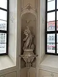 Second sculpture in the main staircase of the Palace