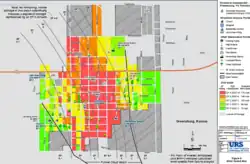 A color-coded map showing damage to structures in Greensburg. Black lines represent the approximate width of the tornado; red indicate severe damage and less severe damage receives a lighter color.