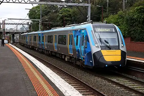 HCMT set 48 running a down Pakenham service passes Hawksburn station, August 2023