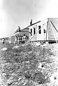 The first barracks being assembled at Harel