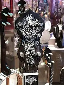 Headstock of Bacon Professional FF 3 Banjo, called the "Chubby Dragon"