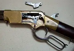 The Henry rifle uses a toggle to lock the breechblock in place.