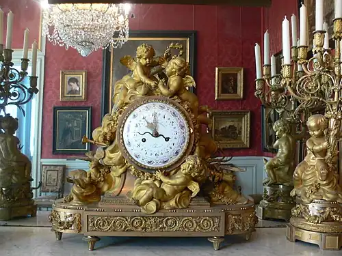 Gilt-bronze mantel clock, dial signed Ferdinand Berthoud (Château de Compiègne).