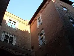 Street façades and tower.