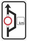 Advance sign for route avoiding restriction