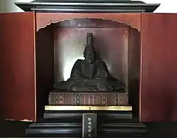 Statute of this person.