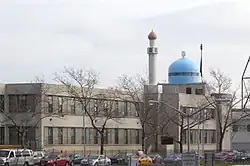 Islamic cleric with Saddam Hussein