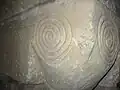 Arch support carved with ammonites