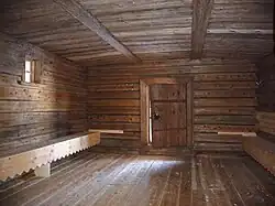 Blistered boardwalk ceiling and boardwalk floor in the refectory
