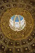Dome of Siena Cathedral, view into the lantern with crown glass windows created by Ulisse De Matteis and installed in 1892.