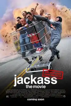 Six gleeful men ride in a massive shopping cart, while three other men hang off the sides. The title is written below, with the tagline "With stuff you'd never see on TV" stamped above.