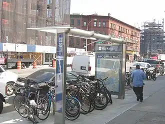 Parking under a bike shelter in Long Island City near Pulaski Bridge