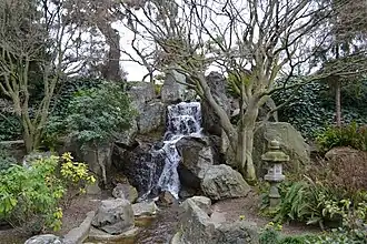 Waterfall between ponds