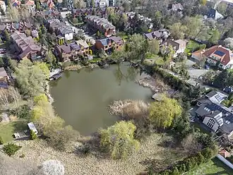 Houses and the Wingert Lake in Pyry, in 2022.