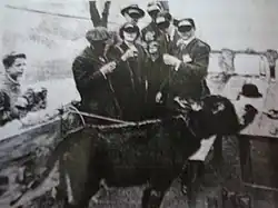 The donkey painting in front of witnesses